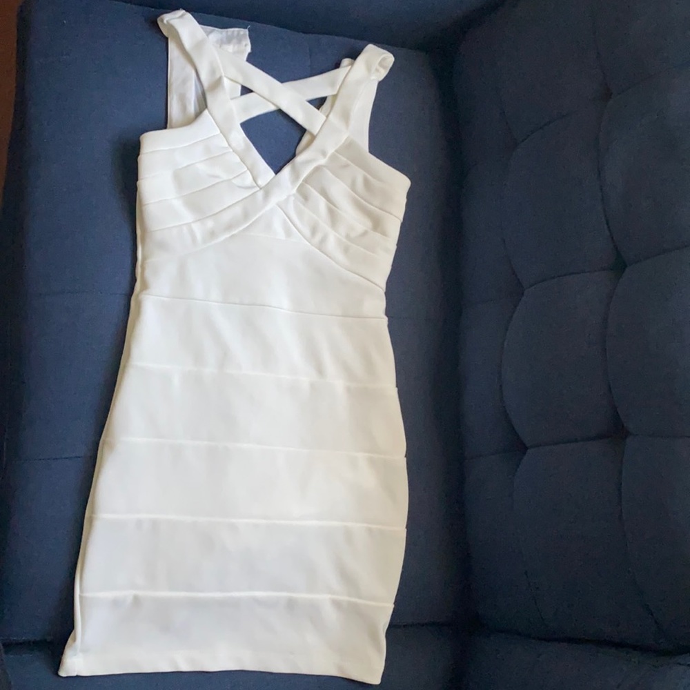 I am selling a white dress by Emerald Sundae